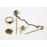A mixed group of jewellery, including a floral stick pin with chain testing as 18 ct, attached to