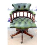 Green leather captain's chair, H88 x W64 x D63cm Some cracks and scuffs to leather, especially to