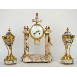 Early 20th century French marble and gilt metal clock and garniture set, architectural case with