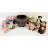 Various Doulton character jugs including Bacchus and Beefeaters, together with Natwest piggy banks