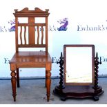 Mahogany dining chair and a mahogany dressing table mirror with serpentine shaped base,