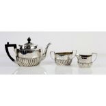 Victorian silver oval three piece tea service by Harrison Brothers & Howson (George Howson)