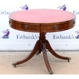 20th century mahogany drum table, with leather inset top above four drawers, on splayed legs and