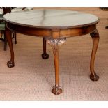 20th Century Mahogany extending dining table on cabriole legs and ball and claw feet. Minor