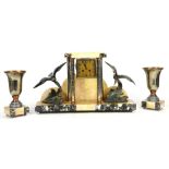 Art Deco marble clock and garniture set, the drum movement signed 'Mesnier Fils, Paris', the dial