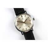 Vintage Omega wristwatch, 34mm stainless steel case, featuring a silvered dial with baton hour