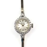 Girard Perregaux ladies diamond-set cocktail watch, silver baton markers, light cream face, 17