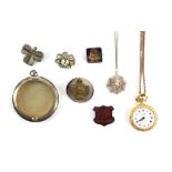 A group of costume jewellery including spider pendant and compact back case, both marked for silver,