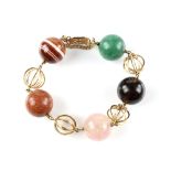 Mid 20th C large gem set spherical bracelet, including banded agate bead, goldstone, rose quartz,