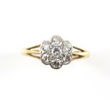 Diamond flower cluster ring, set with seven transitional cut diamonds, estimated total diamond