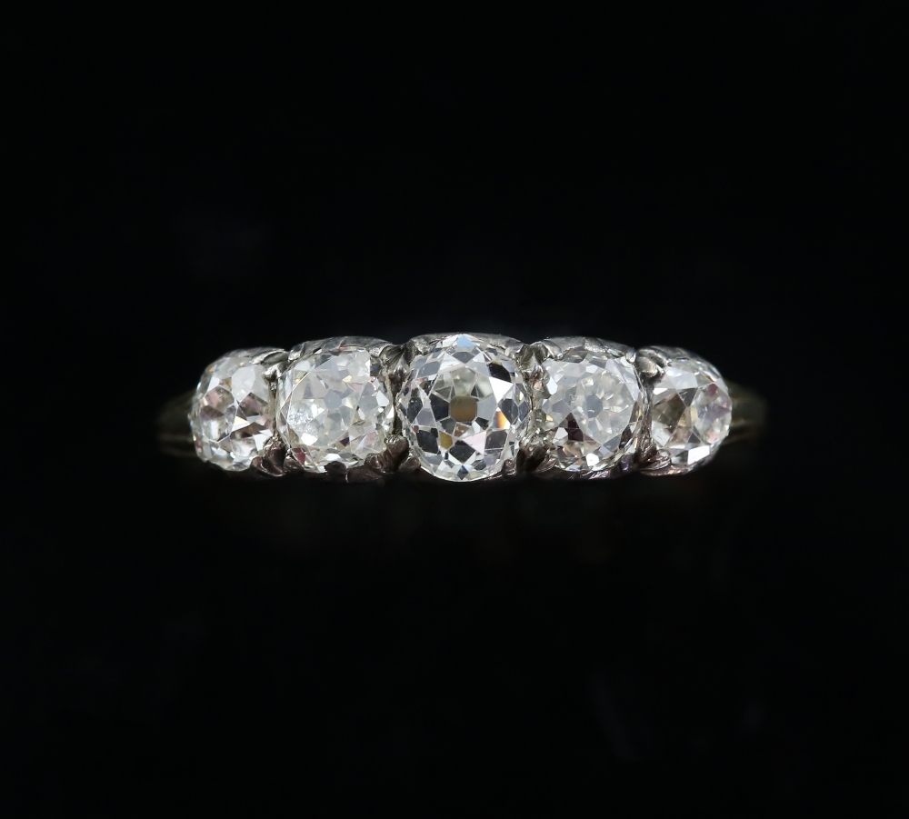 Antique five stone ring, set with graduated old cut diamonds, estimated total diamond weight 1.50