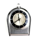 Jaeger Le Coultre travel alarm clock, with black enamel bezel opening to reveal a signed silvered