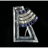French Art Deco sapphire, diamond and rock crystal clip brooch, asymmetric design, with three rows