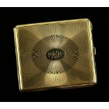 Art Deco gold cigarette case, bearing Chester import marks 1923, central oval engraved panel