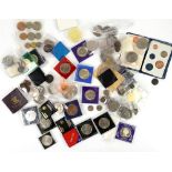A collection of British proof and uncirculated coin sets with some other circulated coins and some