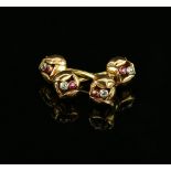 Tiffany & Co. old cut diamond and ruby set rose cufflinks, with a flower to each end connected by