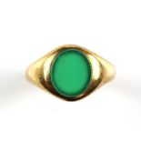 Edwardian signet ring, set with an oval chrysoprase, measuring 11 x 9.2 x 2.9mm, mounted in a