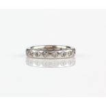 Modern diamond full eternity ring, eighteen round brilliant cut diamonds, weighing an estimated