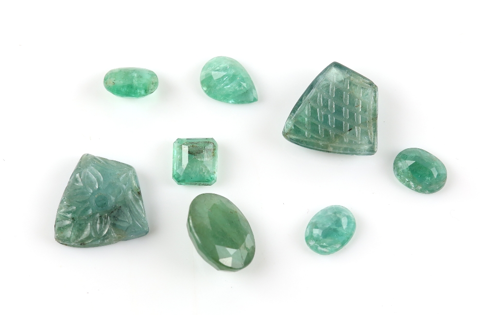 Mixed group of loose emeralds, two carved emerald pieces, floral motif, approximately 15 x 9mm each,