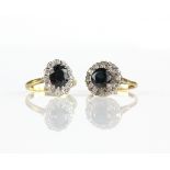 Two sapphire cluster rings; sapphire and diamond oval cluster ring, oval cut sapphire weighing an