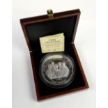 A Falklands 1998 “Lady of the Century” £5 silver proof coin, 0.999 silver, 1.000 kg, in wooden