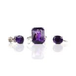 Amethyst and diamond ring; large rectangular faceted amethyst, estimated 12.78 carats, four claw