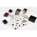 Selection of costume jewellery and watches, including a silver ring, earrings and brooches, together