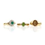 Three gold signet rings and four gem set rings, including diamond and sapphire three stone ring, all