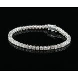 Diamond line bracelet, set with round brilliant cut diamonds, estimated total diamond weight 4.32