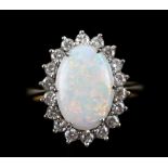 Opal and diamond oval cluster ring, oval cabochon opal, weighing an estimated 1.01 carat, claw