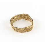 Fancy link gate bracelet, with a textured bark effect clasp, 9 ct yellow gold, London 1977, length
