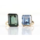 Two synthetic spinel rings, comprising an emerald-cut synthetic blue spinel, mount stamped 9 ct,
