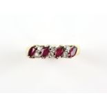 Modern ruby and diamond ring, four marquise cut rubies, each separated by two round brilliant cut