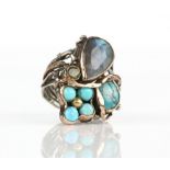 Italian abstract gem set ring, with a pear cut labradorite, round cut peridot and turquoise, mounted