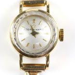 Eterna-matic ladies wristwatch, circular silvered dial, golden baton hour markers, Swiss 17 jewels