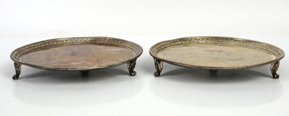 George III pair of silver waiters, the centres engraved with crest with bead and leaf embossed - Image 2 of 8