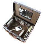George VI silver-mounted travelling dressing table set and vanity case, by Mappin & Webb, London