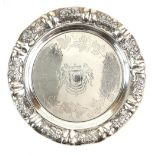 19th Century Dutch silver dish/plate with embossed floral border and a regal crest to centre, 1847