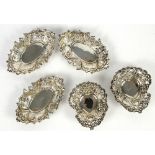 Victorian pair of pierced silver bonbon dishes, Birmingham 1876, 9 cm long, and a set of three