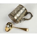 Victorian silver christening mug engraved with panels of flowers, double scroll handle Birmingham