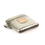 Victorian silver vesta case with a 9ct gold shield form cartouche, Birmingham 1896