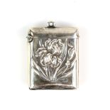 Art Nouveau silver vesta case with an embossed Iris floral design by William J Holmes, Birmingham