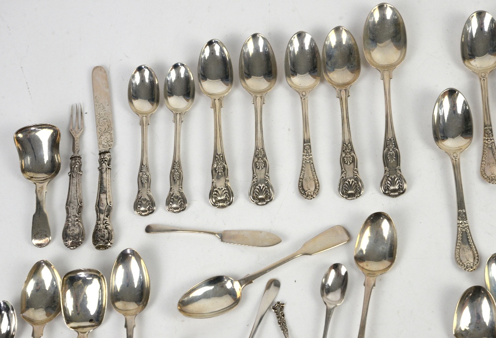 Large group of silver teaspoons and other items, including butter knives, caddy spoons, sugar - Image 6 of 10
