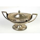 George III silver two handled sauce tureen of oval boat form, with gadrooned border and foot rim,