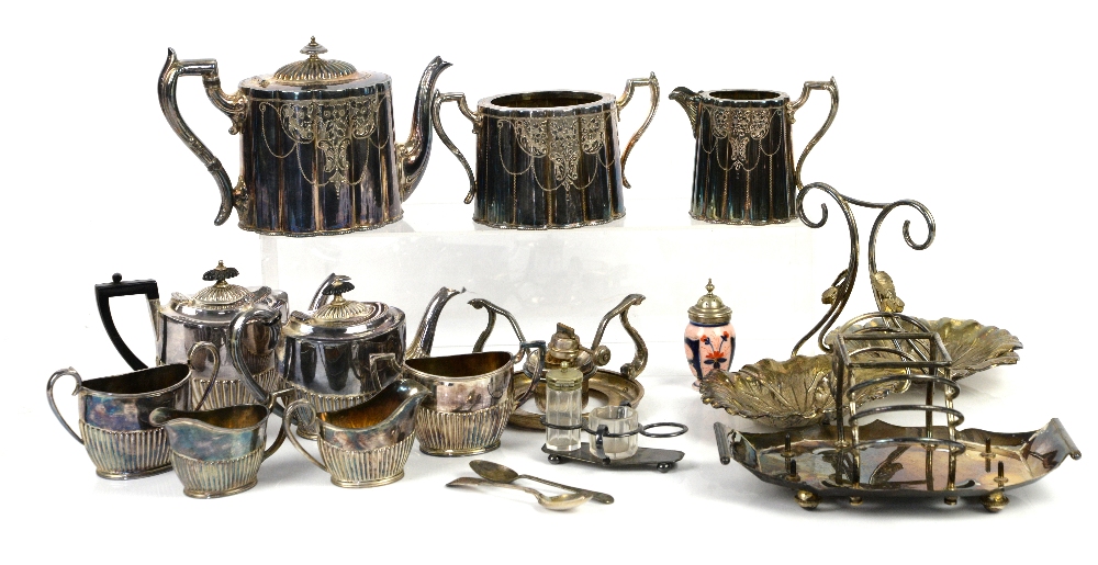 Selection of silver-plated items including tea services, shell shaped cruet, etc