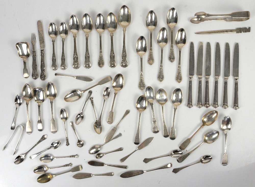 Large group of silver teaspoons and other items, including butter knives, caddy spoons, sugar - Image 2 of 10