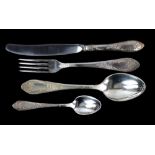 Possibly Russian table-service for twelve place-settings, comprising table knives, forks, spoons,