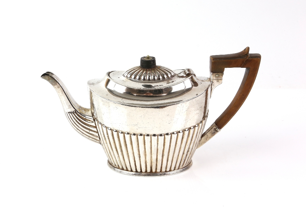 Victorian silver teapot, by Spurrier & Co, Birmingham 1887, the lower body decorated with fluting,