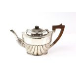 Victorian silver teapot, by Spurrier & Co, Birmingham 1887, the lower body decorated with fluting,