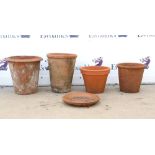 Four terracotta garden pots and a terracotta dish, H42cm Diameter 41cm largest (5)